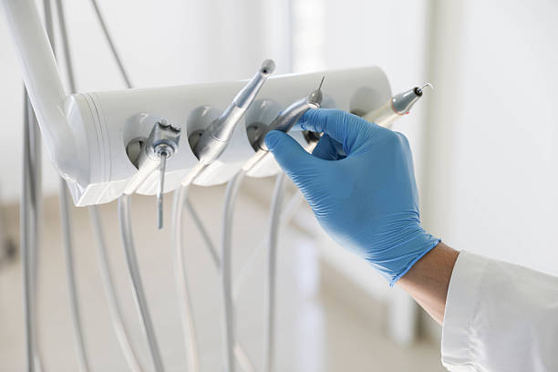 Professional Tooth Extraction technician working in Lafayette, OR